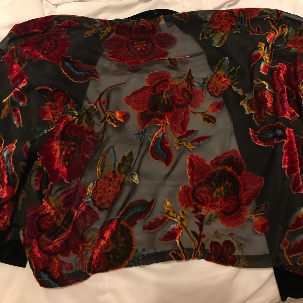 Xhilaration crop length shawl, mainly black and red coloring, lightly worn
